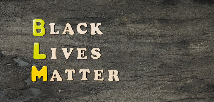 wooden letters with black lives matter words