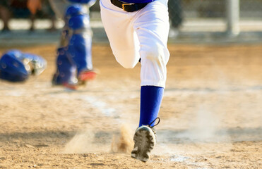 young person playing baseball