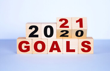 2020-2021 goal word on wooden blocks. The concept of achieving business goals, reaching new...