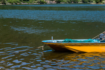 Small yellow fishing boat