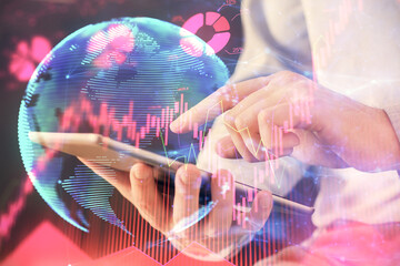 Double exposure of man's hands holding and using a phone and international business theme drawing.