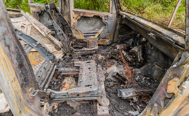 Fototapeta na wymiar Automobile destroyed by fire