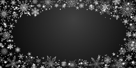 Fototapeta premium Christmas background with various complex big and small snowflakes, white on black, arranged in a ellipse