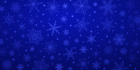Fototapeta na wymiar Christmas background with various complex big and small snowflakes, in blue colors