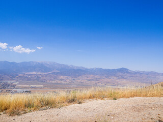 view of a town in the desert on a nice summer day