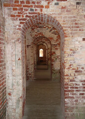 Architectural Hallway of Old Red Brick Arches