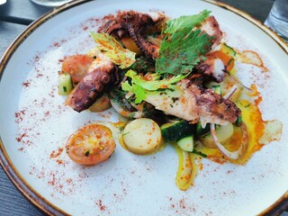 grilled octopus tentacle with vegetables