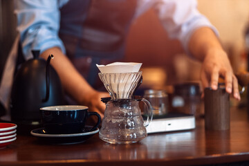 Fototapeta na wymiar Measuring coffee drip with glass mug