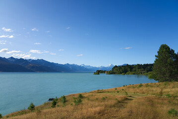 Panoramic view of Lake Pukaki, New Zealand, the turquoise water comes from Mt. Cook and Tasman glacier, South Island