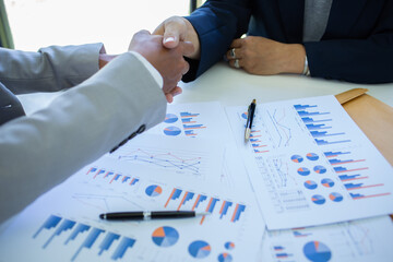 businessman handshake for investment projects online marketing.concept