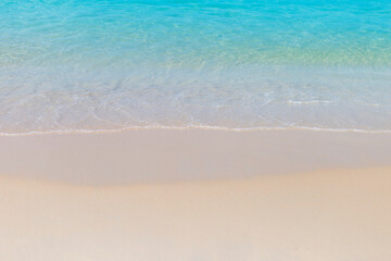Clear blue sea water on clean fine sand beach, summer season concept, nature background, outdoor day light, clean environment
