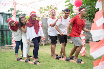 youths followed the bakiak race on the 17th of August Independence Day in Indonesia