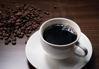 Hot coffee and coffee beans