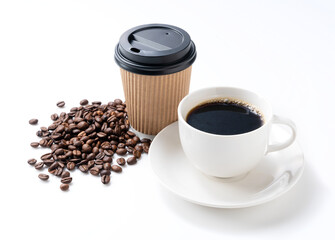 Coffee and coffee beans and paper cups on a white background