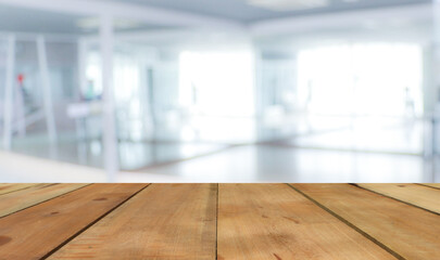 Wooden terrace with space for placing items or advertising media with a blurred white background