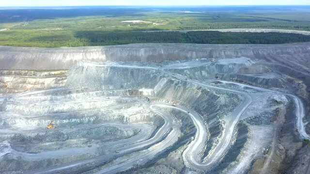 Flying over a quarry for mining. View from above 