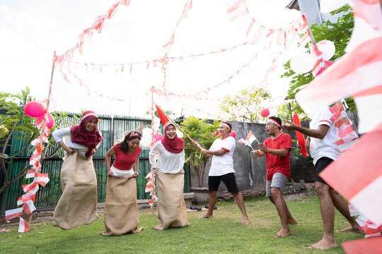 Sack participants compete in the field and the audience supports together when this event commemorates the celebration of Indonesian Independence Day