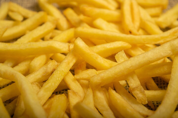French fries scattered surface texture. Close up.