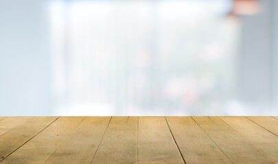 Wooden terrace with space for placing items or advertising media with a blurred white background