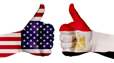 Two hands are painted with flags of different countries, with a thumb raised up. Egypt and the USA