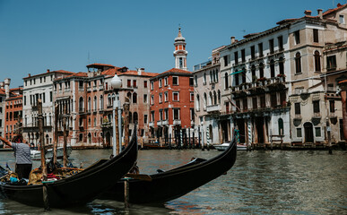 Gondola on canal in Venice. The charm of Italy.