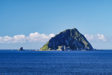 Keelung Seascape - Famous Keelung Islet with morning blue bright sky, shot from Heping Island Park in Zhongzheng District, Keelung, Taiwan.