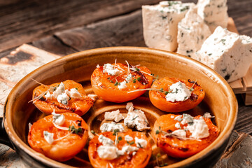 Close up grilled peaches with and goat dorblue cheese, Delicious snack