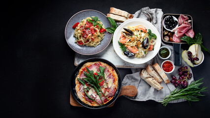 Italian food  on dark background