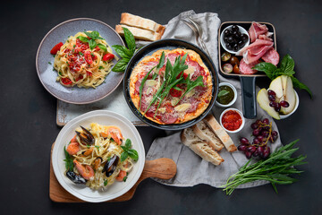Italian food  on dark background