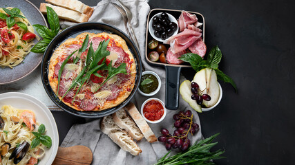 Italian food  on dark background