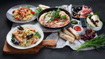 Italian food  on dark background