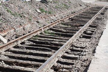 old railroad tracks in the gravel