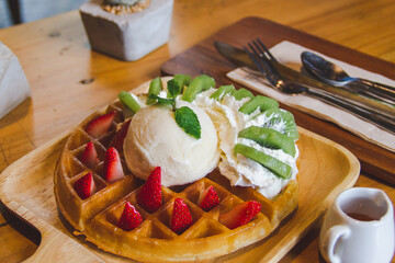 Ice cream and wafers.topped with fruit