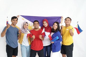 excited asian young supporter holding philippine flag over white background