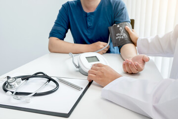 The doctor measured blood pressure, the patient examined the heartbeat and talked about health care...
