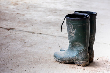 Boots are placed on the concrete floor 5648