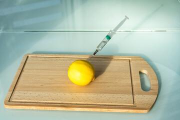 lemon and syringe. citrus and nitrates