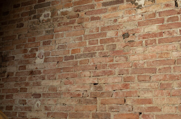 ancient brick wall in chic apartment in horizontal and tilted orientation