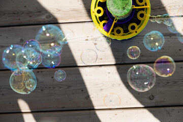 Bubble machine blowing bubbles at a children's party