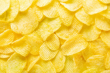 background corrugated golden chips with texture, top view