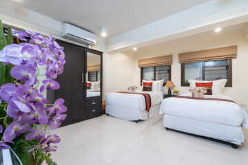Interior design of house, home, condo and villa feature double bed, red bed runner, and dressing table in bedroom