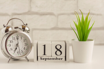 September 18 according to the wooden calendar.One day of the autumn month.Calendar for September. Autumn.