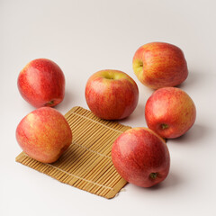 Red Organic Envy Apples Ready to Eat on white background