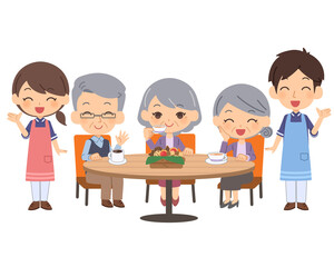 認知症カフェで楽しむ人々と介護士