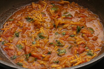 Gujarati Dish - Sev Tamatar Sabzi
