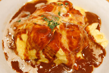 Japanese chicken tomato rice omelette with demi-glace sauce in Kyoto, Japan