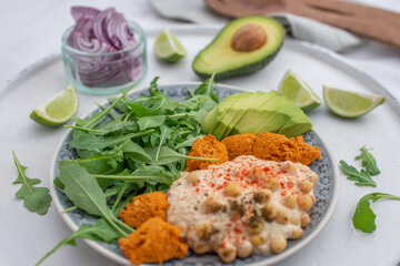 healthy home made avocado hummus salad bowl