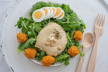 healthy home made avocado hummus salad bowl