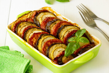 Traditional french dish ratatouille. Vegetable casserole with eggplant, tomato and zucchini in a ceramic form