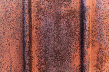Texture of fluted rusty metal plate. Corrugated